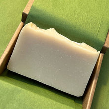 Classy soap in open box on green tissue paper
